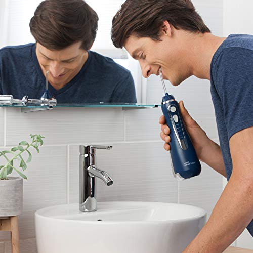 Waterpik Irrigador Inalámbrico Avanzado con 3 Posiciones de Control del Agua a Presión con Batería Recargable, Eliminación de Placa Dental Ideal para Viajar y para Baños Pequeños, Azul (WP-563UK)