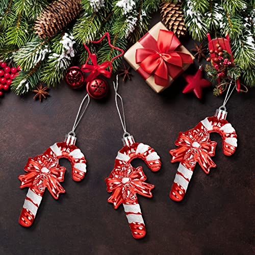 LEMESO Bastones de Caramelos Decoración Colgantes Navidad Bolas Plástico para Colgar Árbol de Navidad 12 Piezas Candy Cane Decorativas Brillantinas Bastones con Lazo -Color Rojo y Blanco